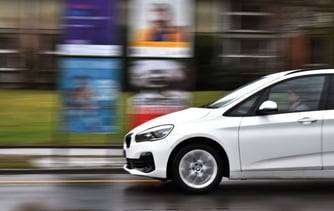 car speeding on the road