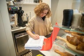 woman preparing inventory to help stop shoplifters